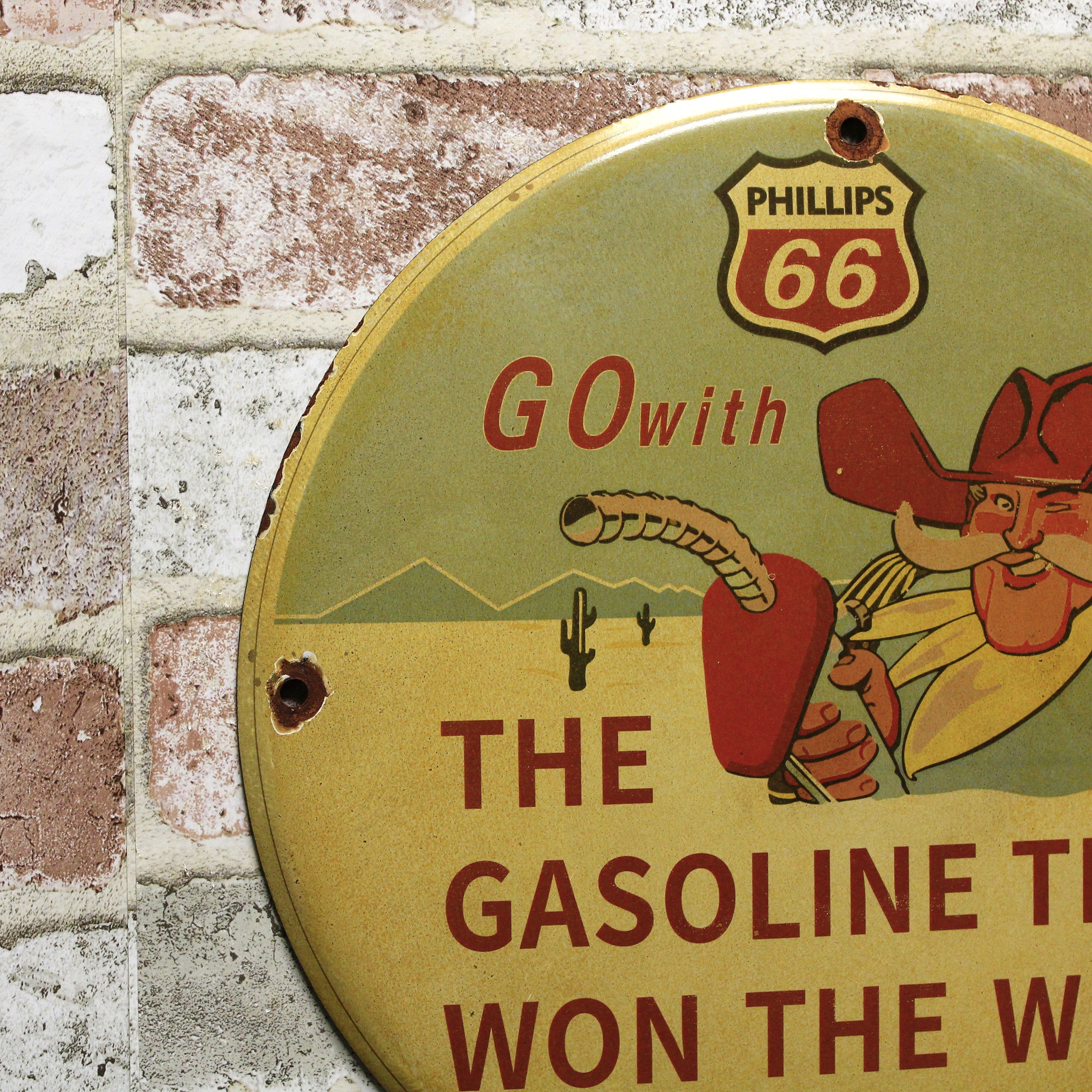 Phillips 66 Cowboy Gas That Won the West Vintage Porcelain Enamel Sign (12in)