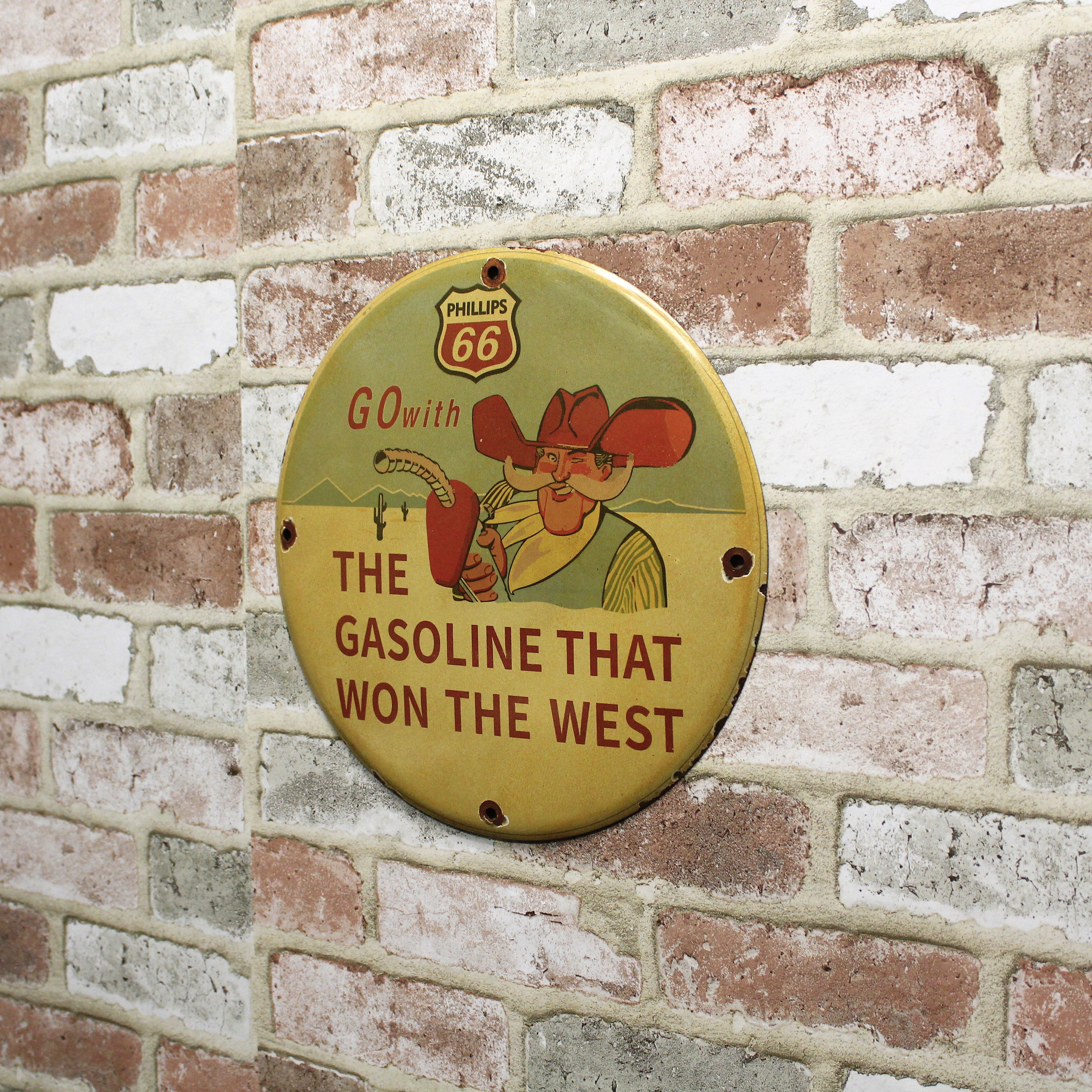 Phillips 66 Cowboy Gas That Won the West Vintage Porcelain Enamel Sign (12in)