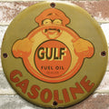 Gulf Fuel Oil Smiling Driver Porcelain Enamel Sign (12in)