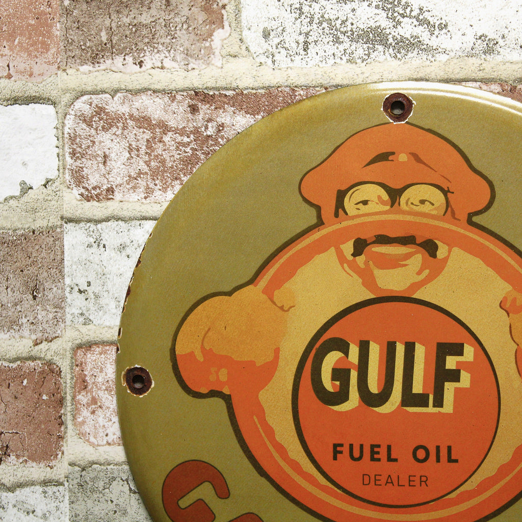 Gulf Fuel Oil Smiling Driver Porcelain Enamel Sign (12in)