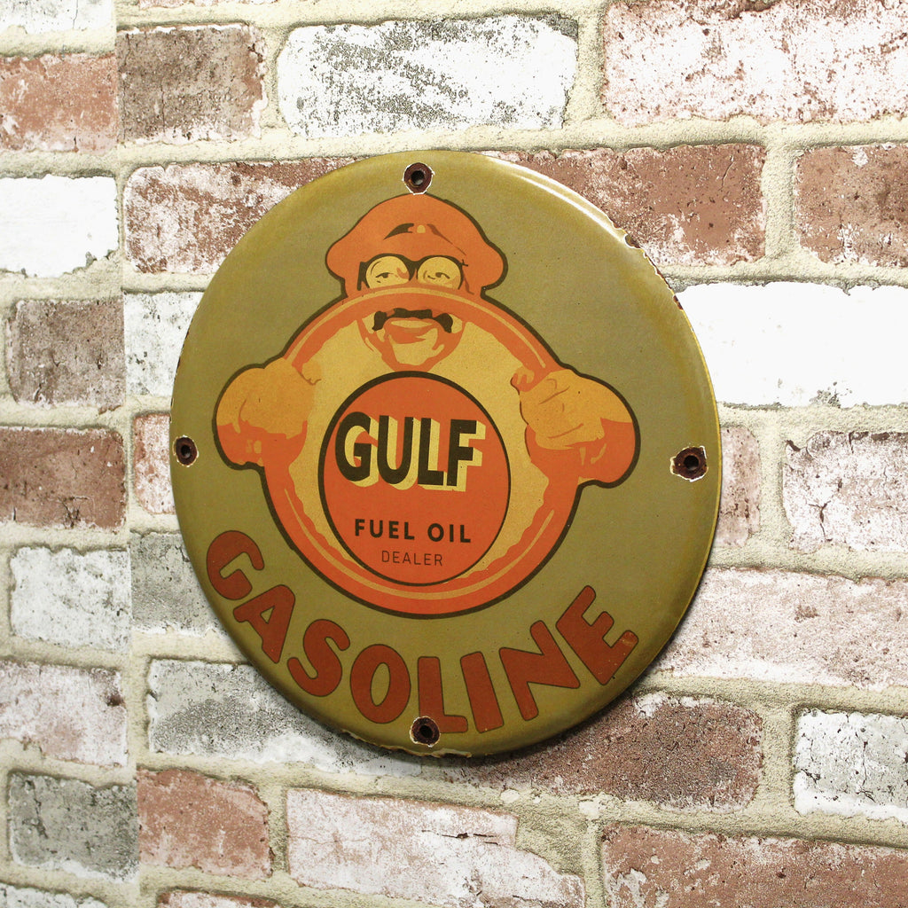 Gulf Fuel Oil Smiling Driver Porcelain Enamel Sign (12in)