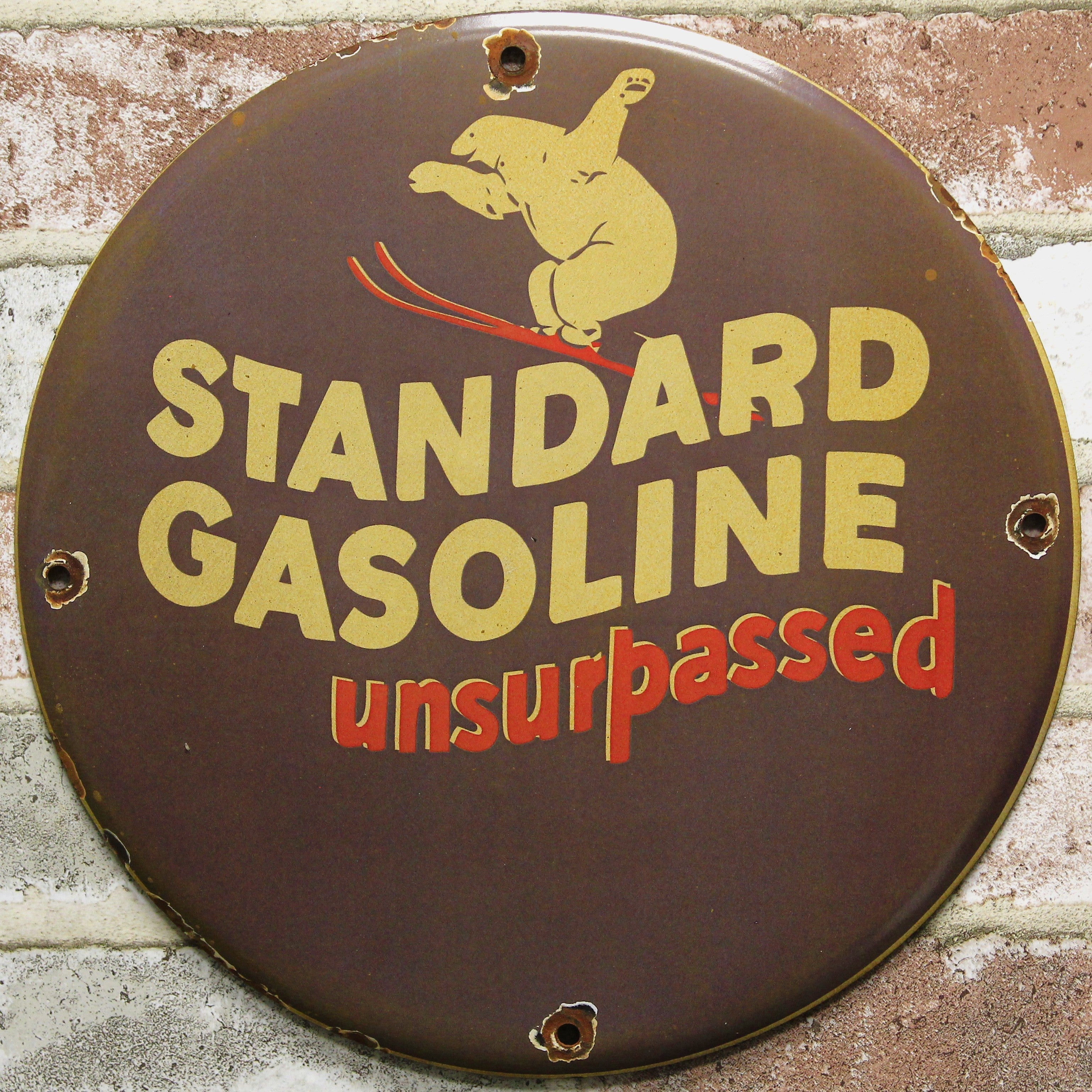 Standard Gasoline Polar Bear Ski Unsurpassed Porcelain Enamel Sign (12in)