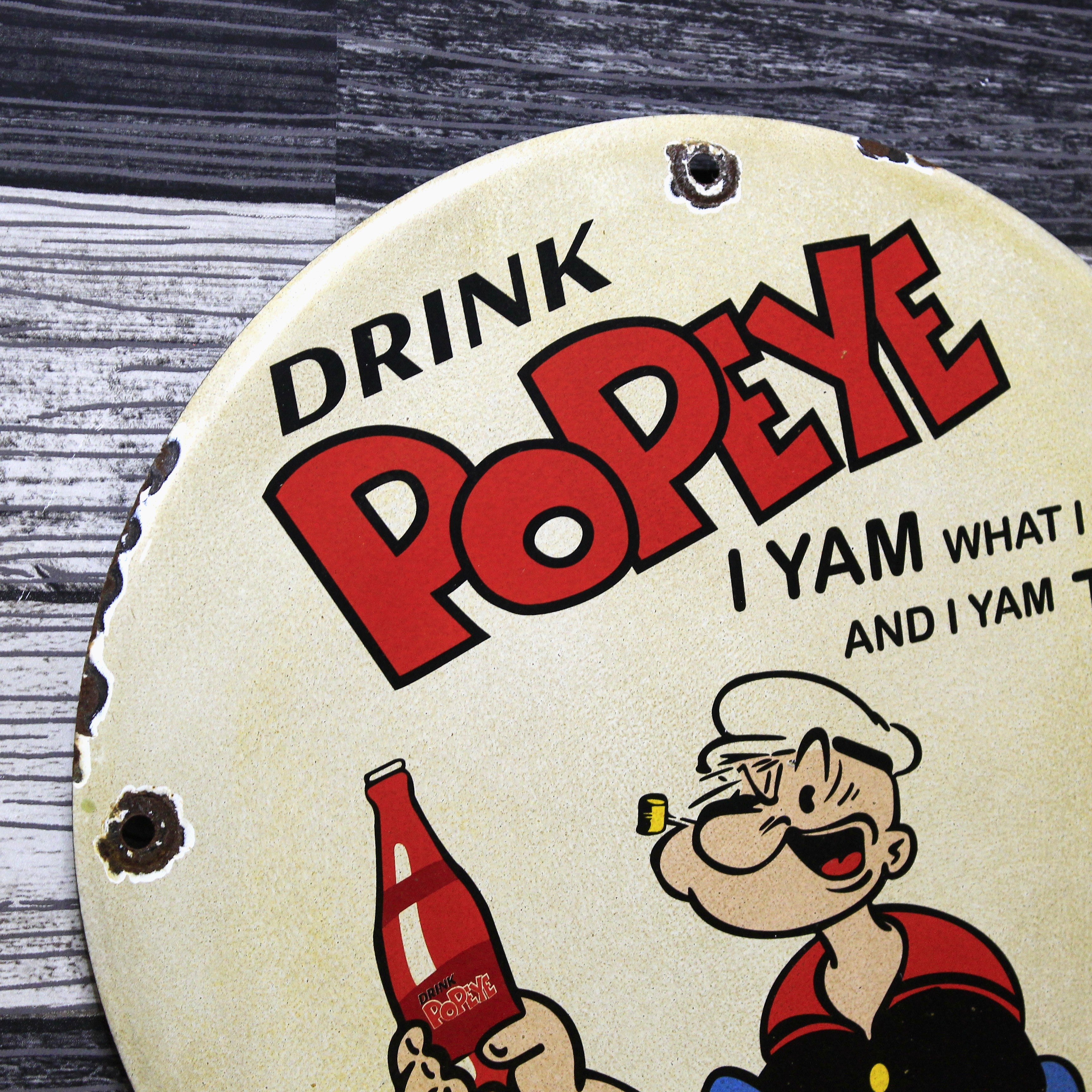 Drink Popeye Vintage Tops Porcelain Enamel Sign (12in)