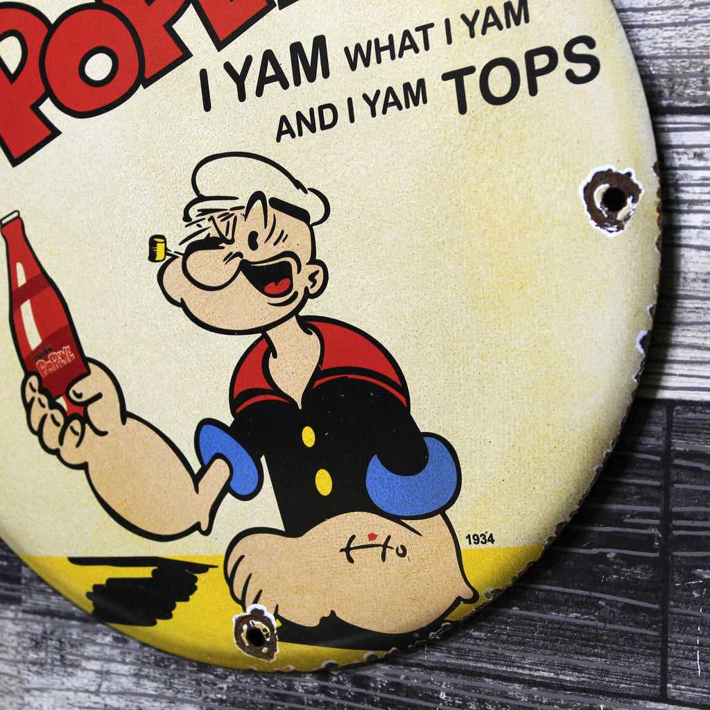 Drink Popeye Vintage Tops Porcelain Enamel Sign (12in)
