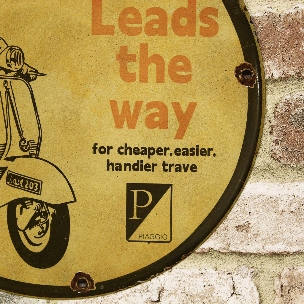 Vespa Leads the Way Porcelain Enamel Sign (12in)