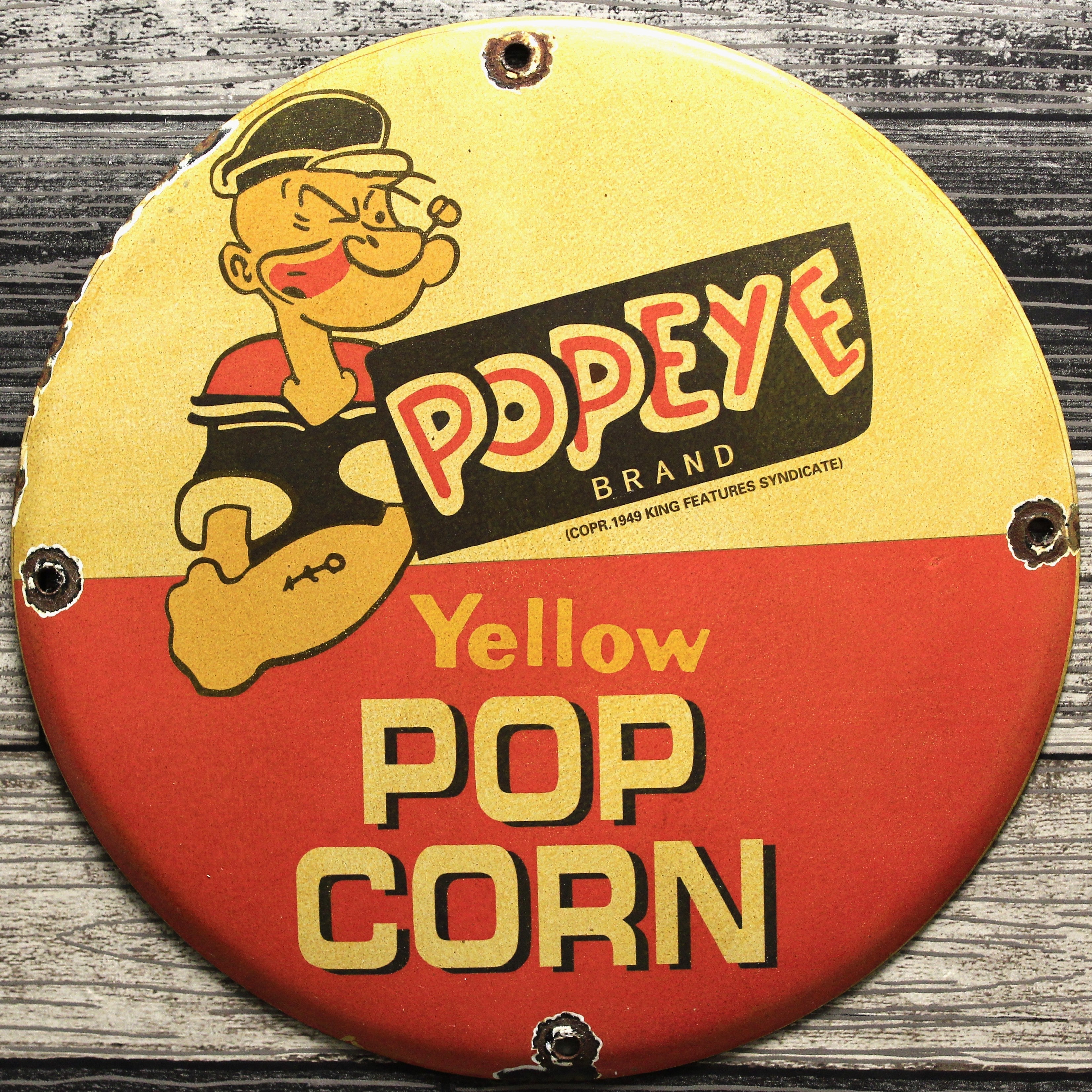 Yellow Pop Corn Popeye Brand Porcelain Enamel Sign (12in)