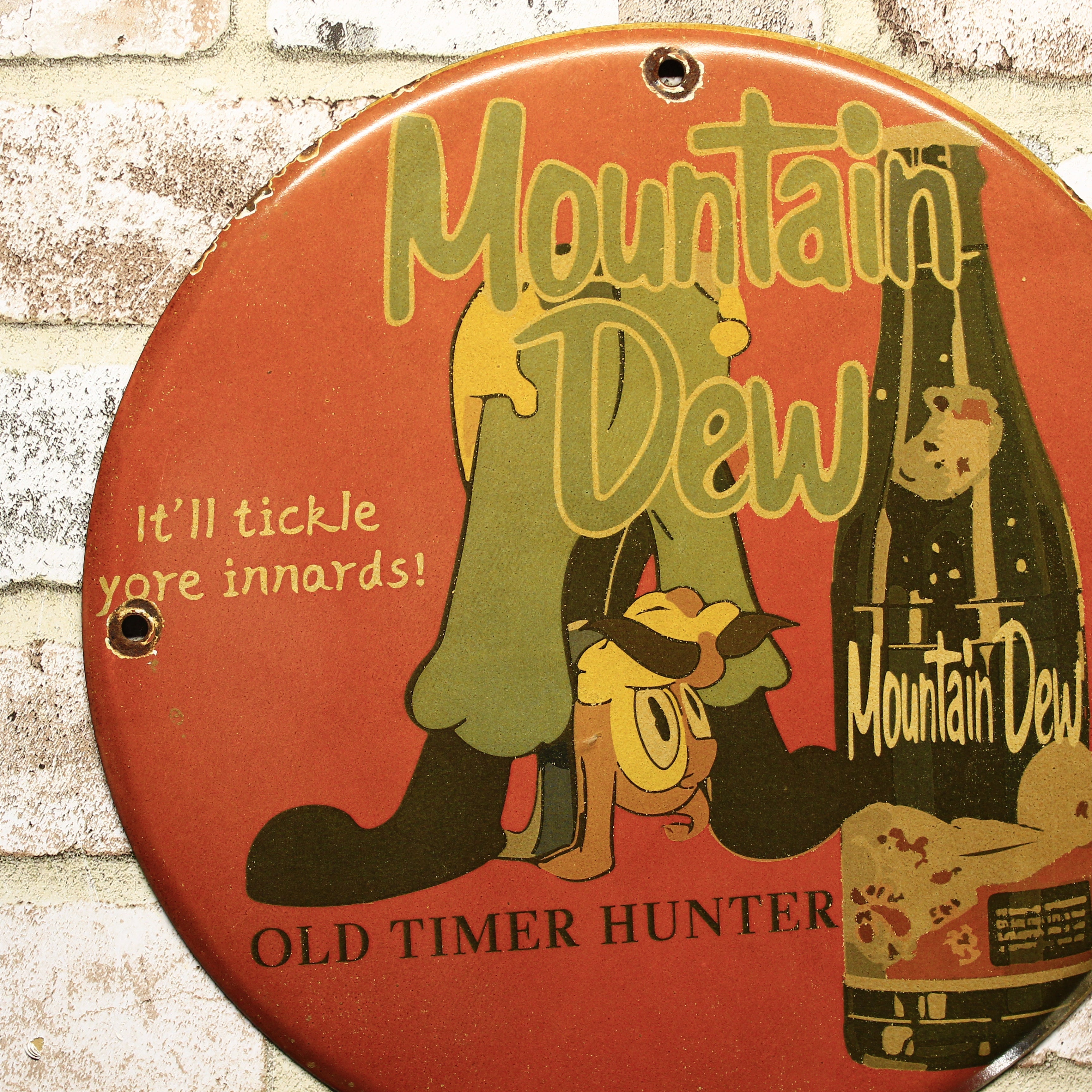Mountain Dew It'll Tickle Your Innards Porcelain Enamel Sign (12in)