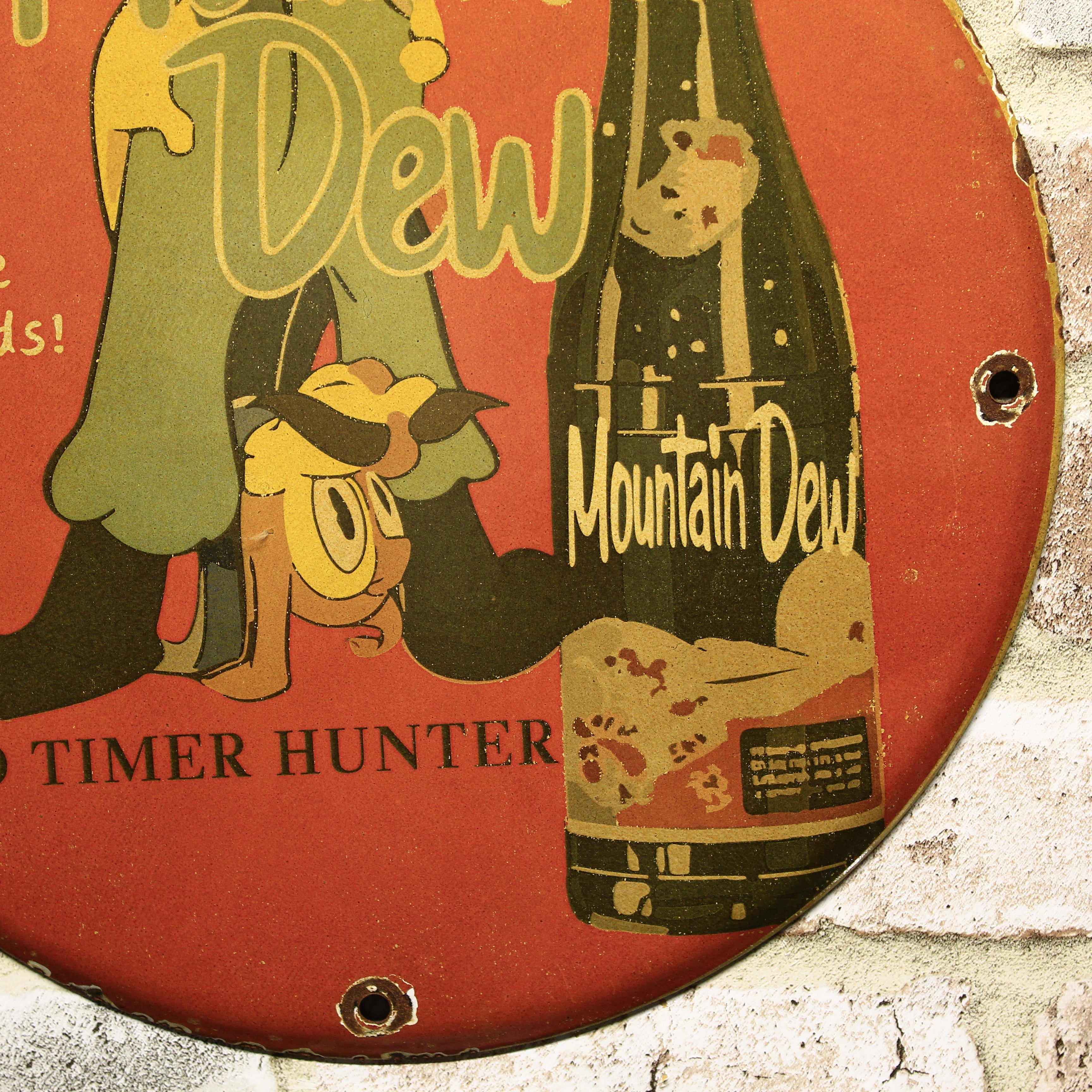 Mountain Dew It'll Tickle Your Innards Porcelain Enamel Sign (12in)
