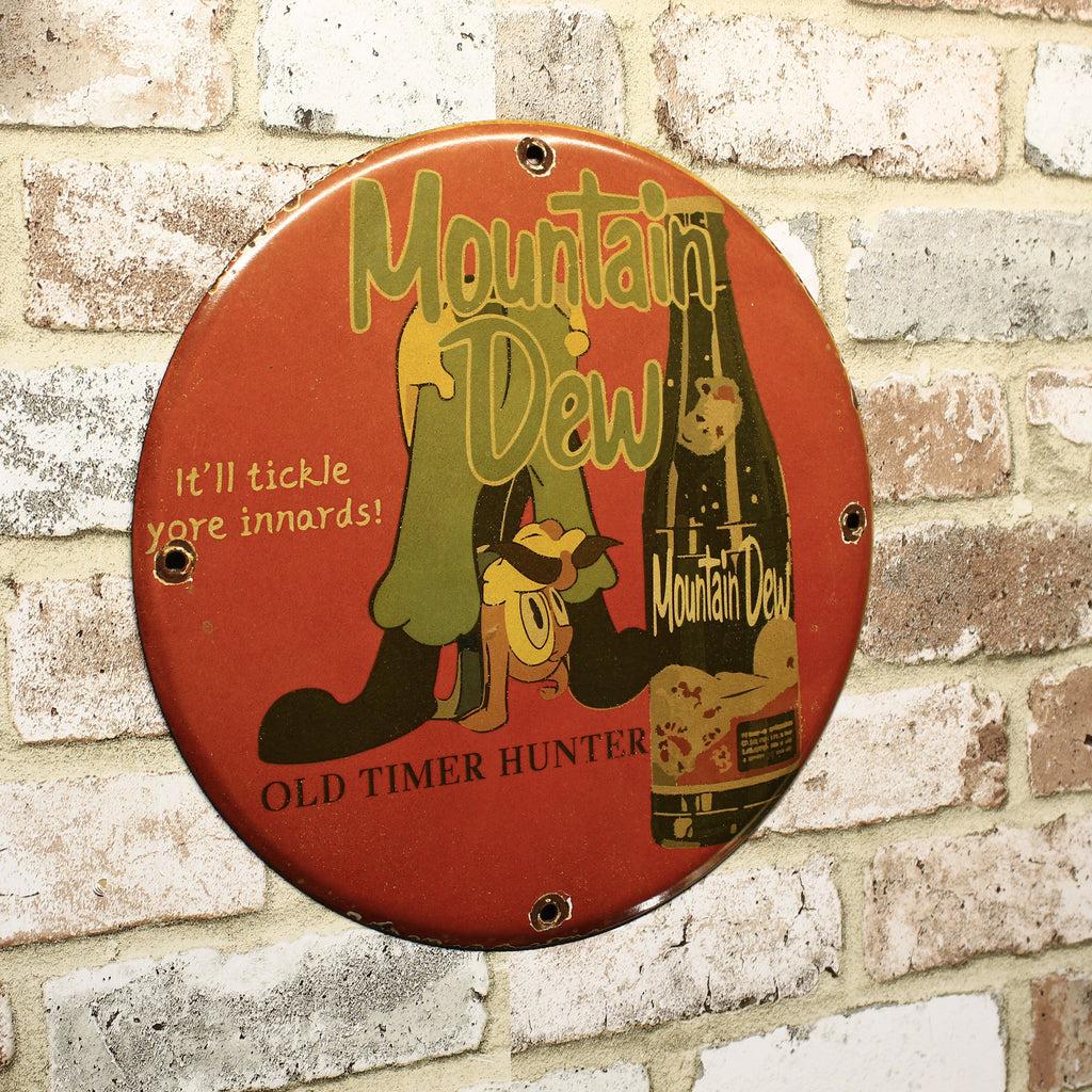 Mountain Dew It'll Tickle Your Innards Porcelain Enamel Sign (12in)