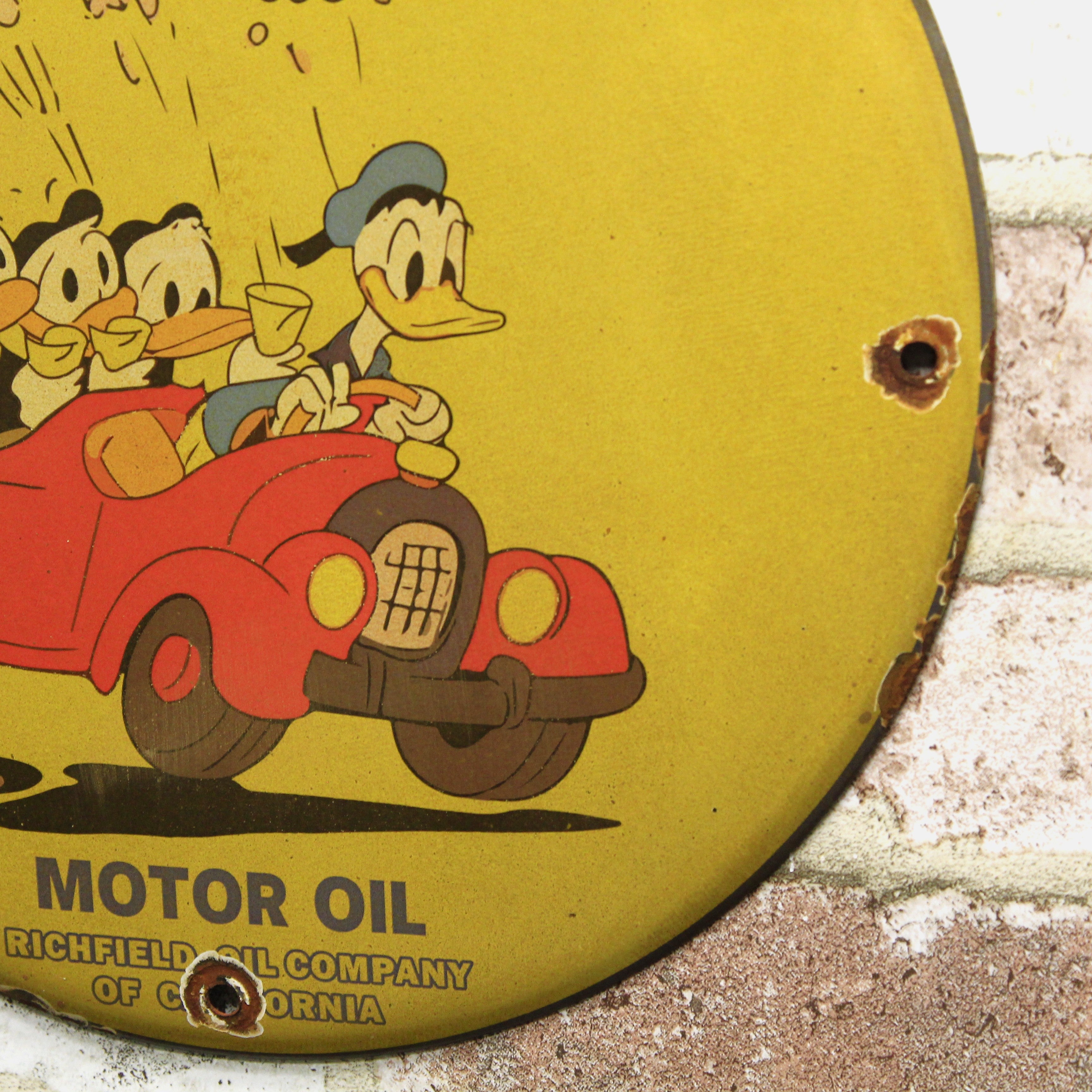 Richlube Motor Oil Donald Duck & Kids Porcelain Enamel Sign (12in)