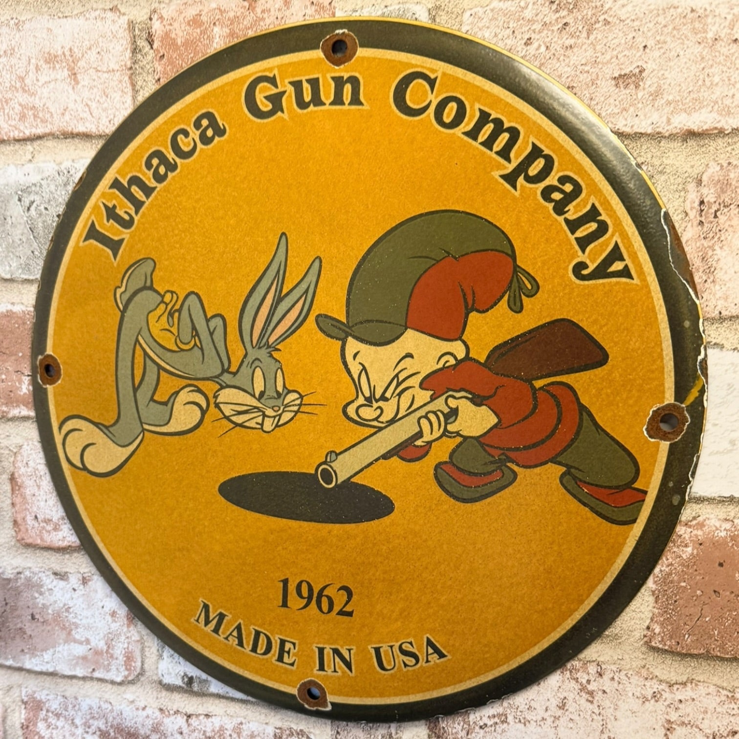 Ithaca Gun Company Porcelain Sign with Nostalgic Elmer Fudd + Bugs Bunny Vintage Advertisement