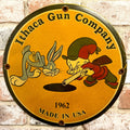 Ithaca Gun Company Porcelain Sign with Nostalgic Elmer Fudd + Bugs Bunny Vintage Advertisement