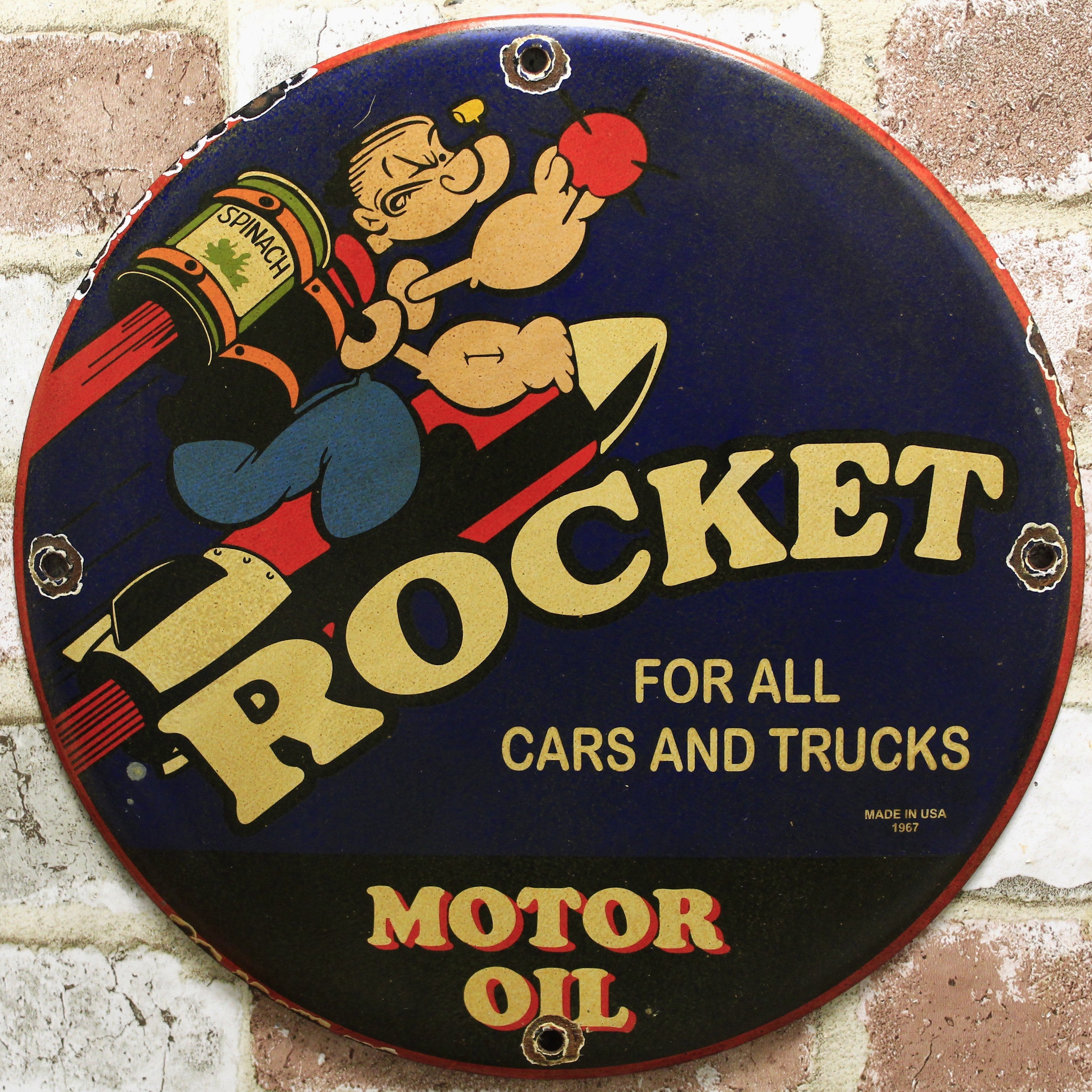 Rocket Motor Oil with Popeye Porcelain Enamel Sign (12in)