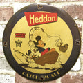 Heddon Catch Em All with Mickey & Donald Porcelain Enamel Sign (12in)